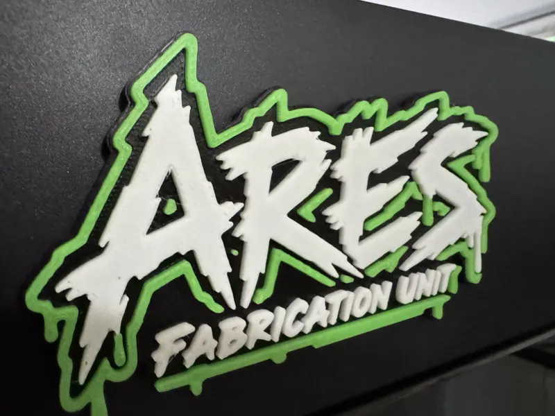 ARES Fabrication Unit, Three-colour raised logo sign